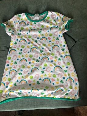 Sew Magnolia Smocks with Green Trim and Multicolor St. Patrick’s Print